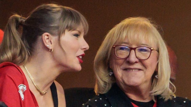 Taylor Swift and Donna Kelce talk during the Broncos-Chiefs game at Arrowhead Stadium on Oct. 12, 2023.